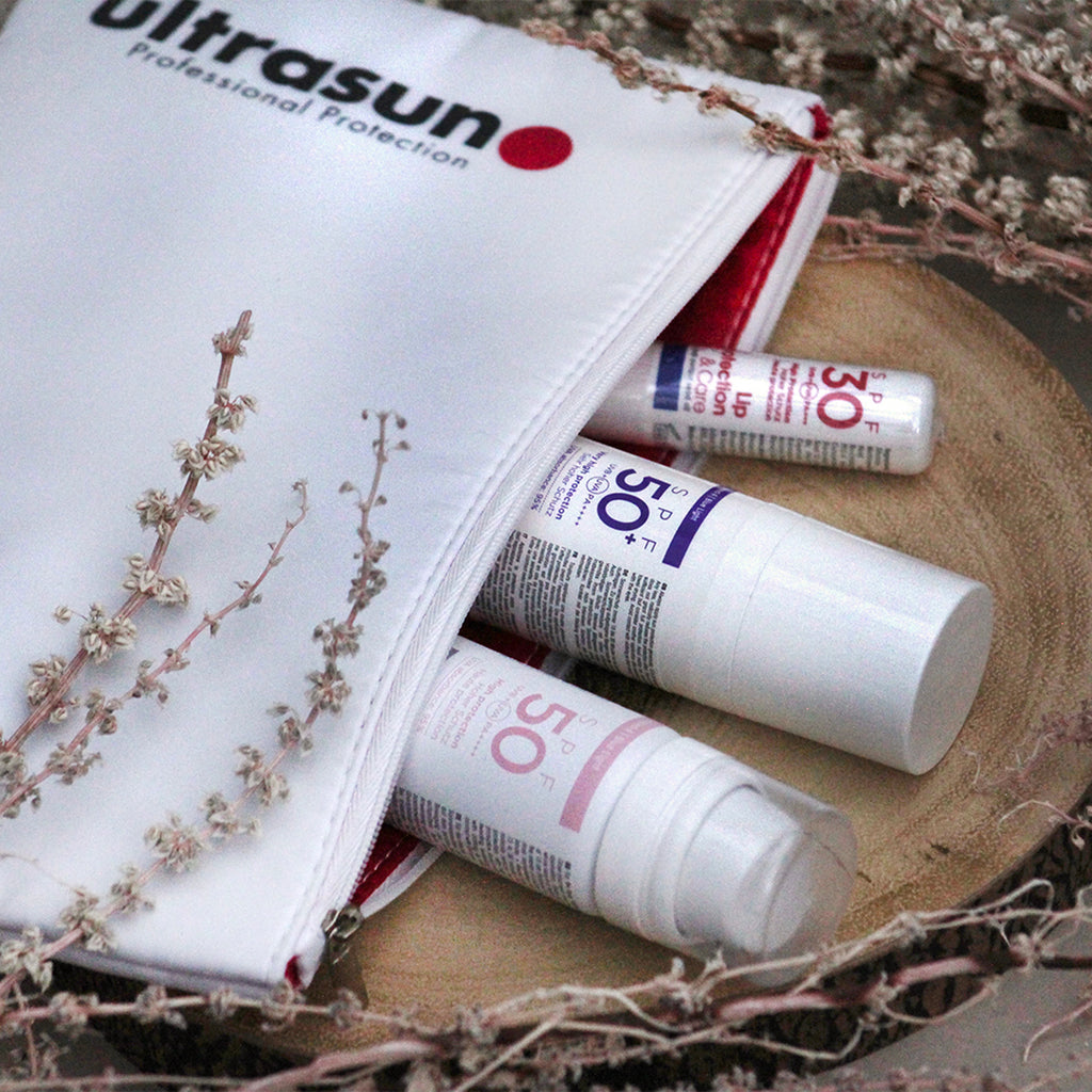 Ultrasun Winter Skin Kit with a botanical background